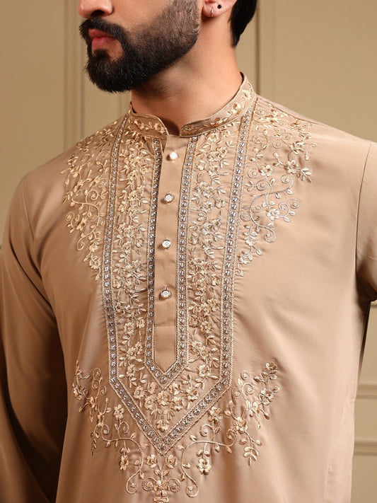 Men's sequins embroidered kurta and pants set by HOUSE OF KURTAS, featuring intricate sequin embroidery on traditional attire.