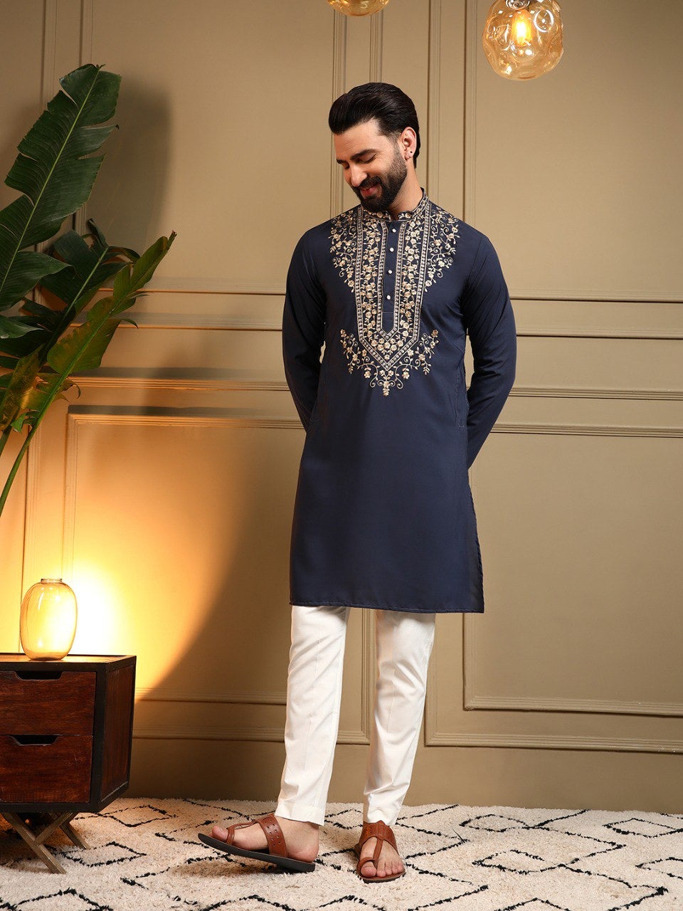 Men's sequins embroidered kurta and pants set by HOUSE OF KURTAS, featuring intricate sequin embroidery on traditional attire.