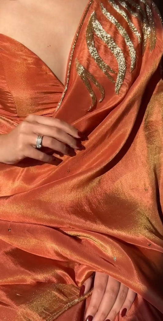 Enchanting Orange Chinon Saree