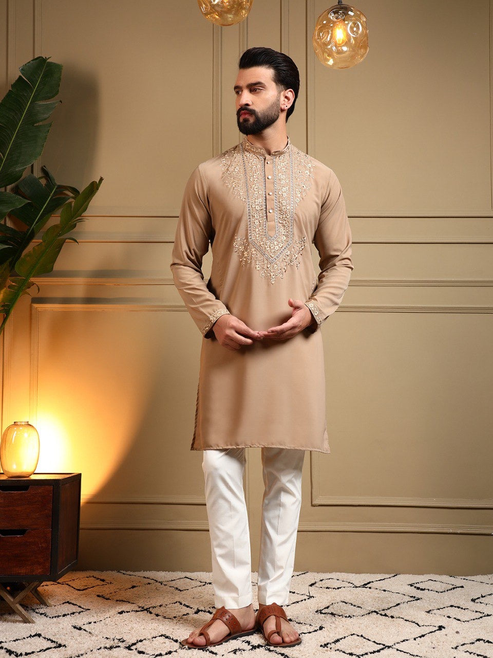 Men's sequin embroidered kurta and pants set by HOUSE OF KURTAS, featuring intricate embroidery and elegant design.