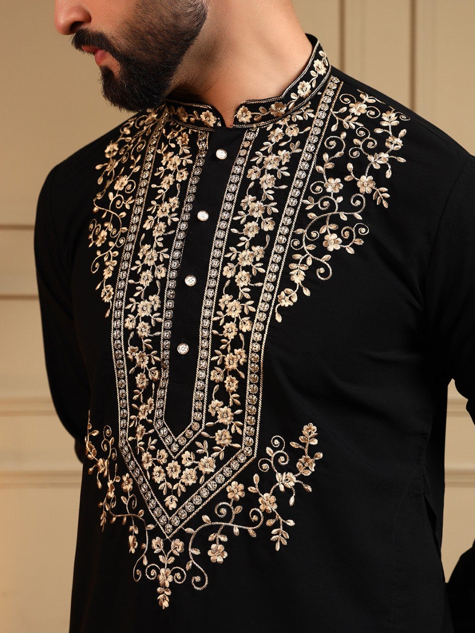 Men's sequin embroidered kurta and pants set by HOUSE OF KURTAS, featuring intricate embellishments and traditional design.
