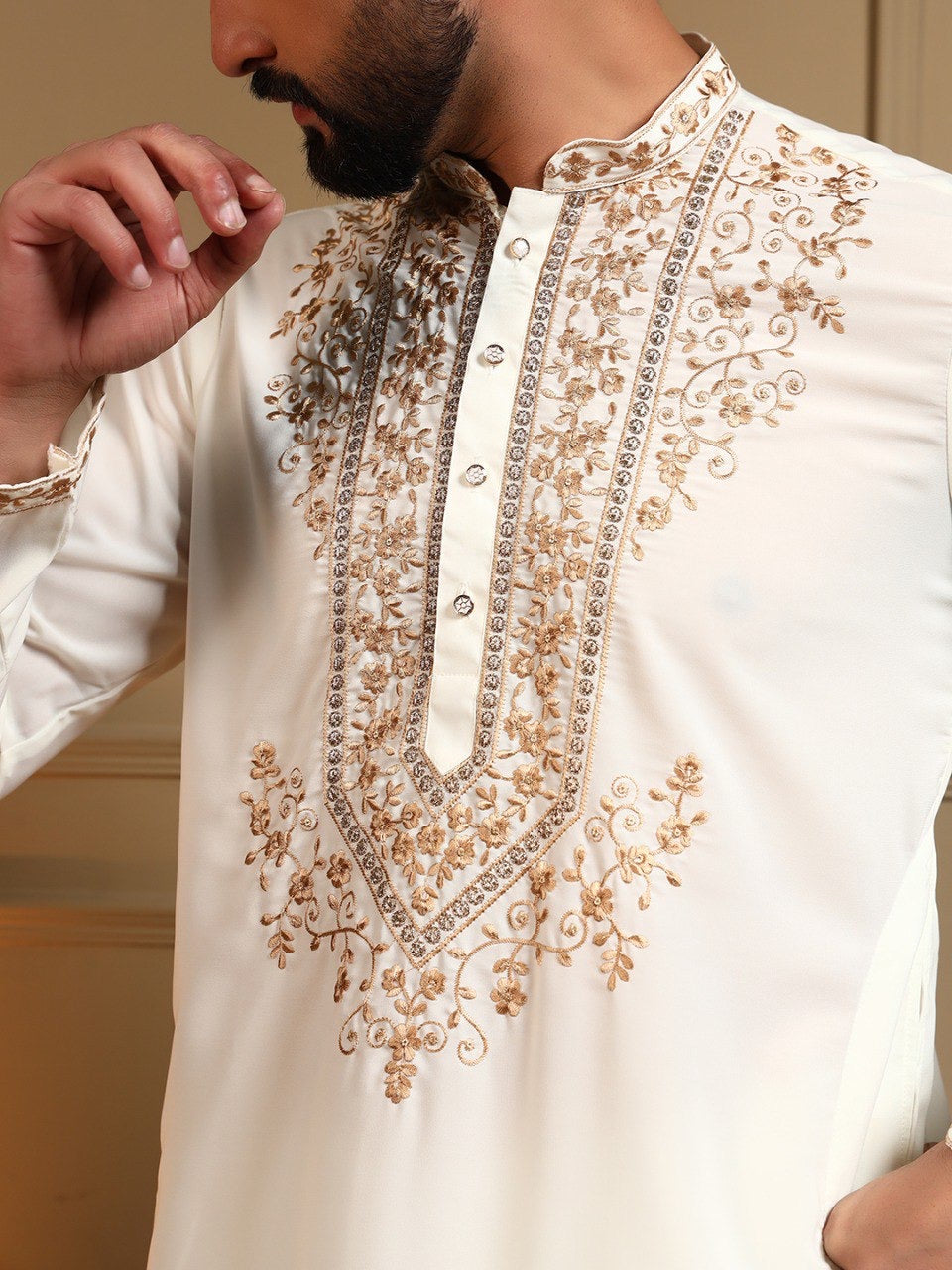 Men's sequins embroidered kurta and pants set by HOUSE OF KURTAS, featuring intricate embroidery and festive design.