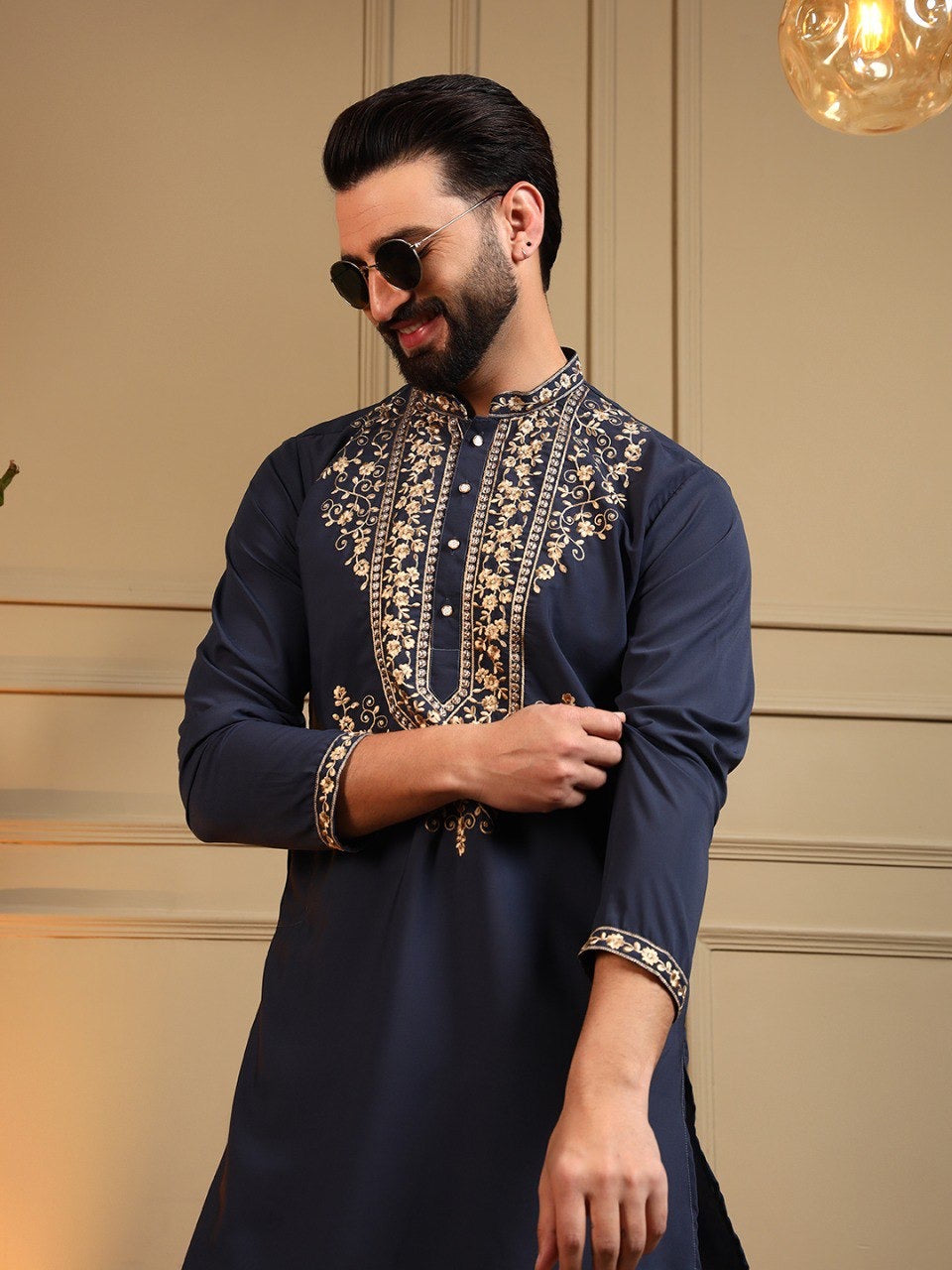 Men's sequins embroidered kurta and pants set by HOUSE OF KURTAS, featuring intricate embroidery and stylish traditional design.